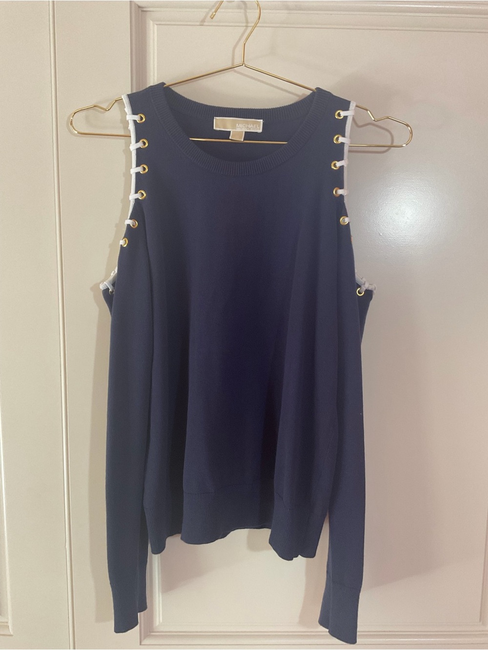 Michael Kors Navy Cold-Shoulder Sweater with White Trim and Gold Eyelets